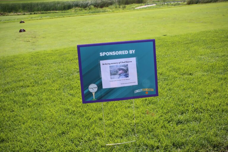 Hole sponsor sign at Ben's Longball Classic 2026 (photo 94 of 218)