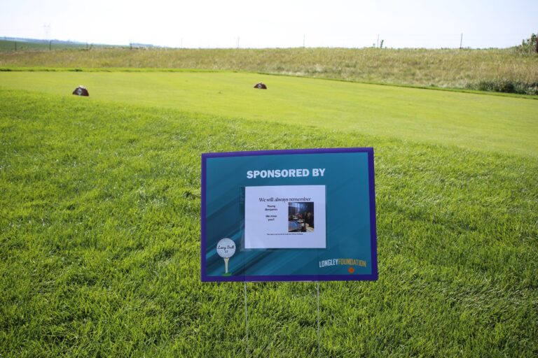 Hole sponsor sign at Ben's Longball Classic 2026 (photo 102 of 218)